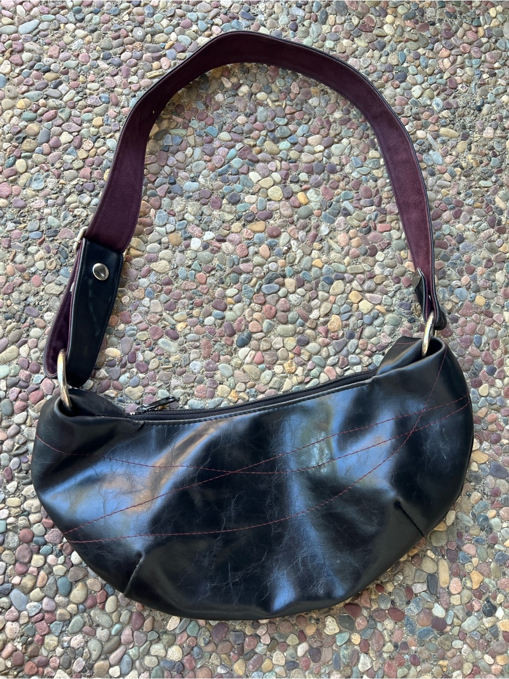 Y2k Black bag is by Crystolyn Kae and features a purple interior lining